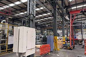 Submain cabling entering a section board in a factory